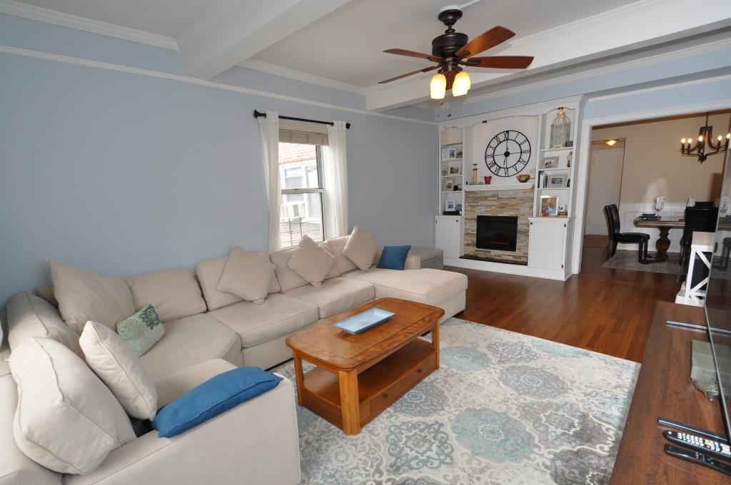 766 Palmer Road, Unit 2E Bronxville, NY 10708 - Photo 1 of 1 a living room with furniture and a fireplace