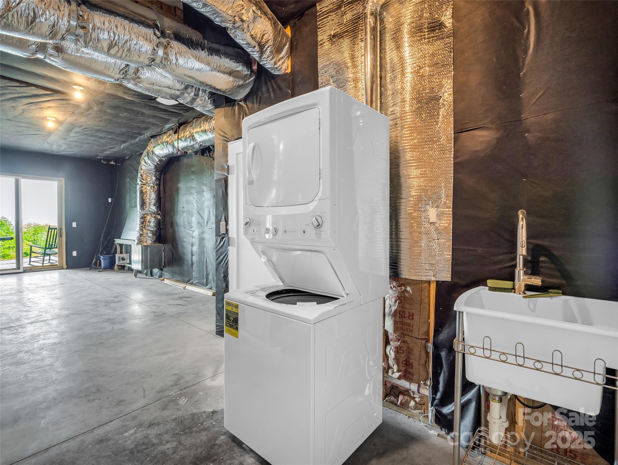 627 Cherry Hill, Unit 201 Mill Spring, NC 28756 - Photo 32 of 48 a bathroom with a sink a mirror and shower