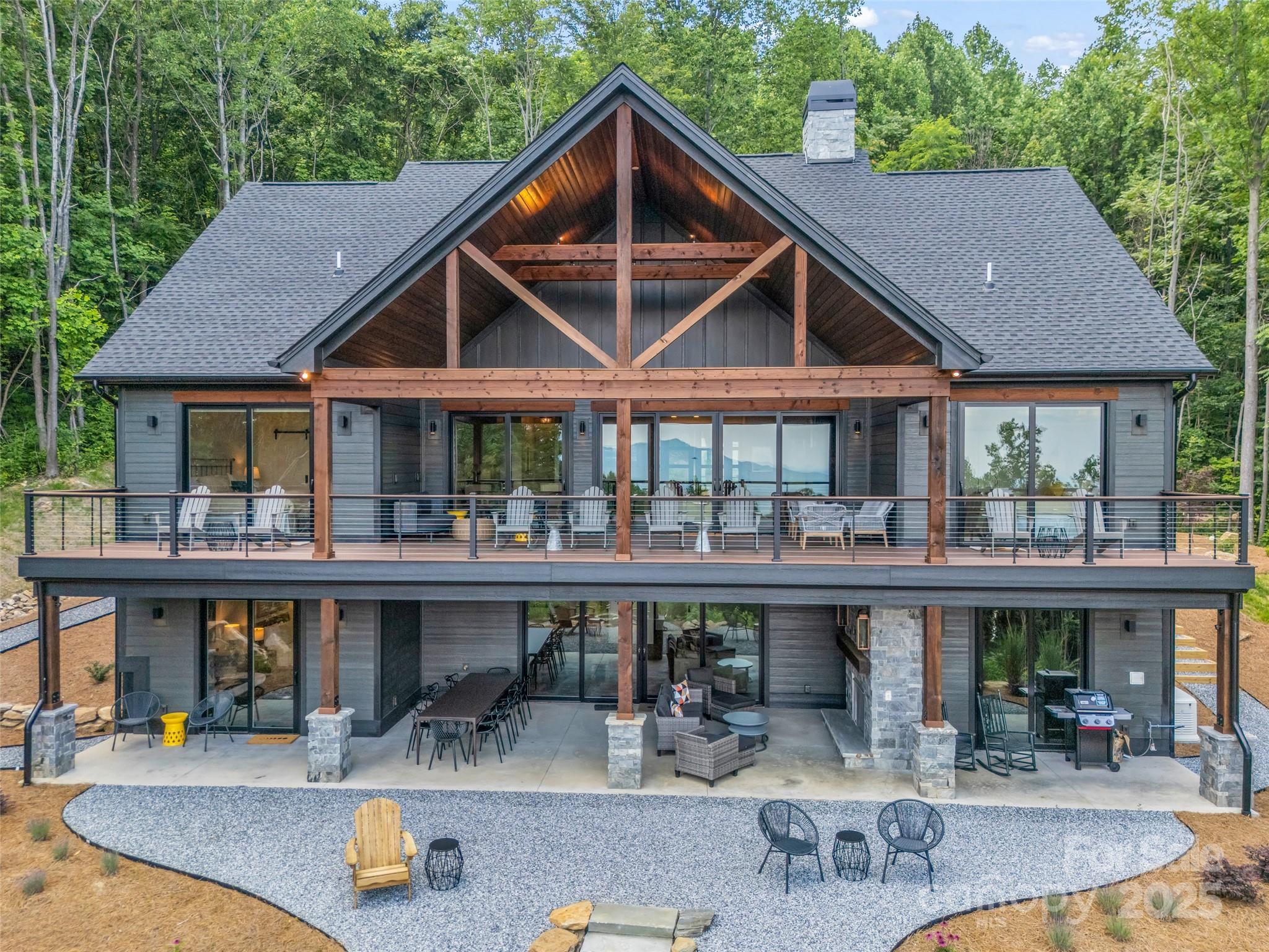 627 Cherry Hill, Unit 201 Mill Spring, NC 28756 - Photo 35 of 48 an outdoor view of the house and swimming pool
