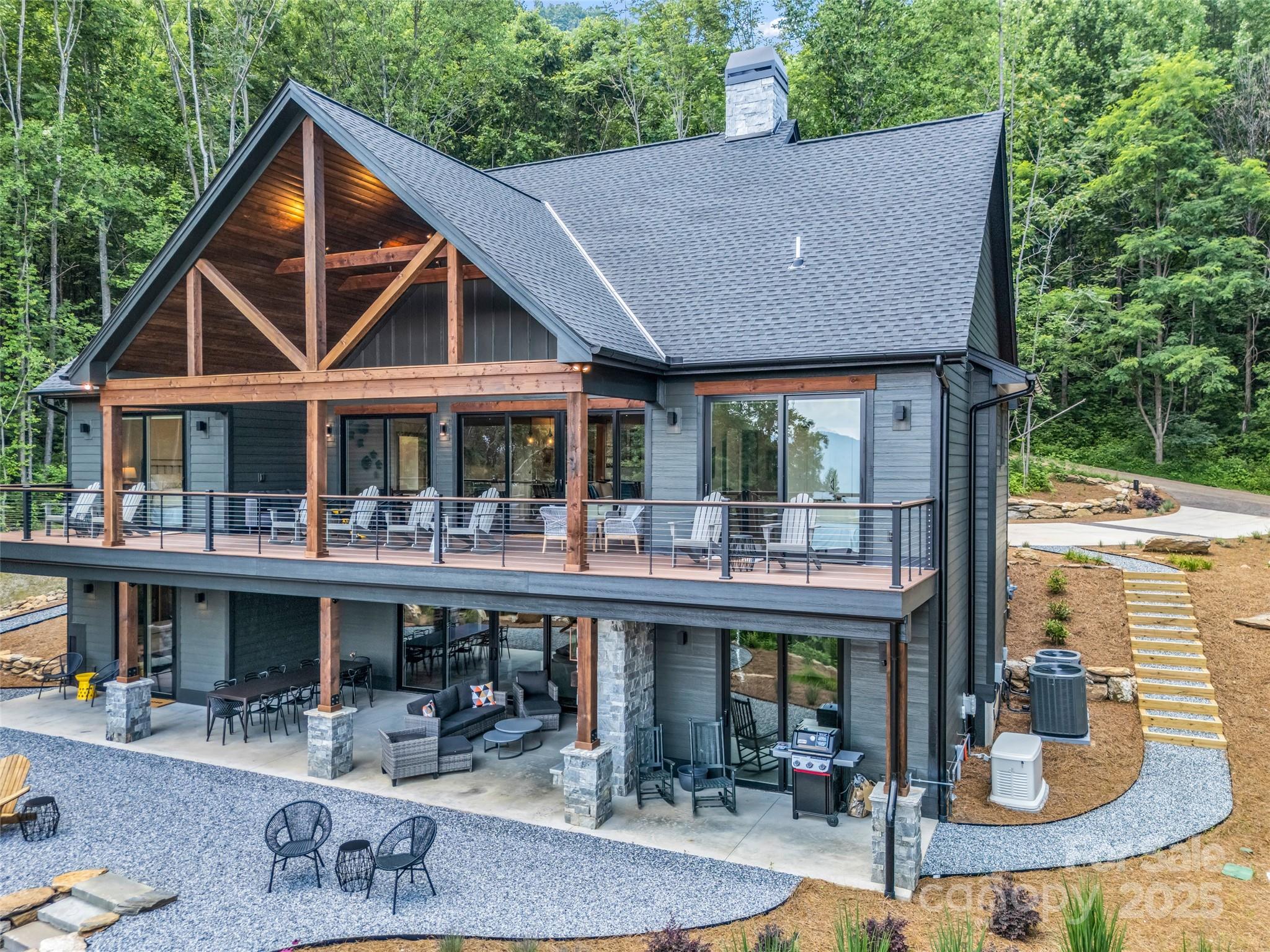 627 Cherry Hill, Unit 201 Mill Spring, NC 28756 - Photo 42 of 48 a house view with a outdoor space