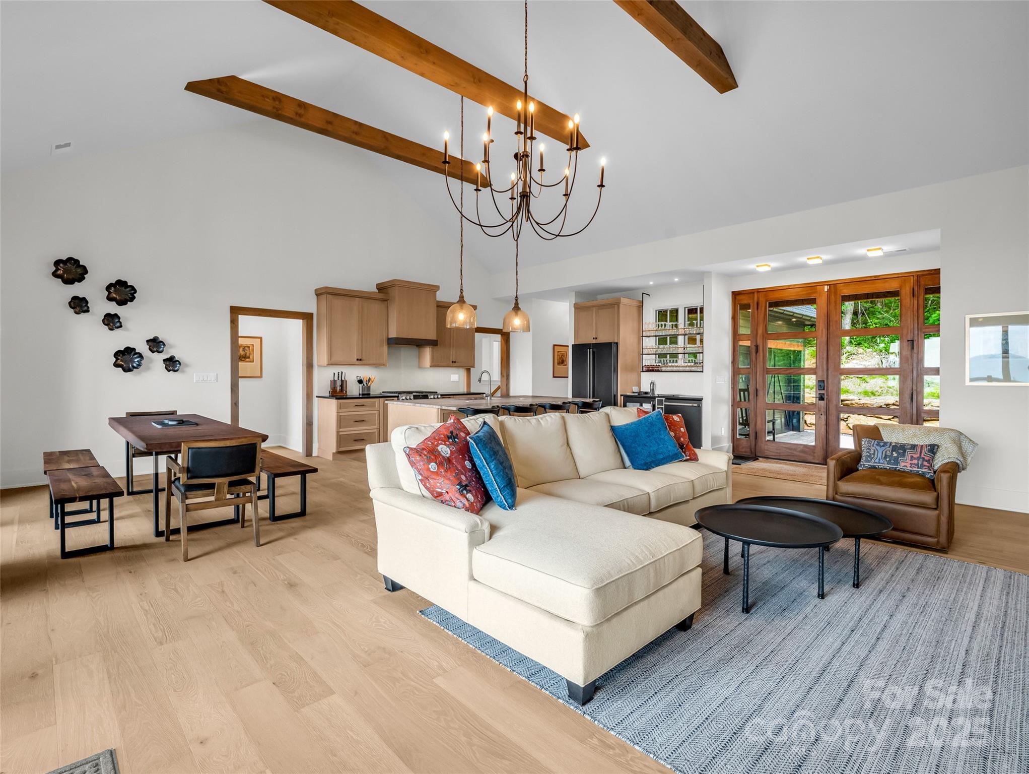 627 Cherry Hill, Unit 201 Mill Spring, NC 28756 - Photo 8 of 48 a living room with furniture and wooden floor