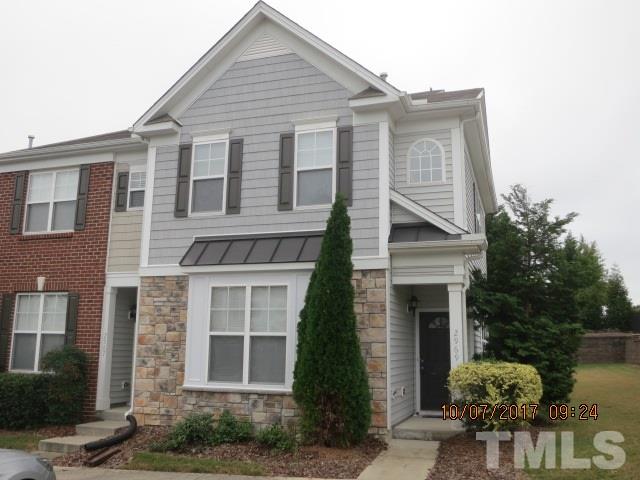 2969 Casona Way Raleigh, NC 27616 - Photo 1 of 7 a front view of a house with a yard and garage