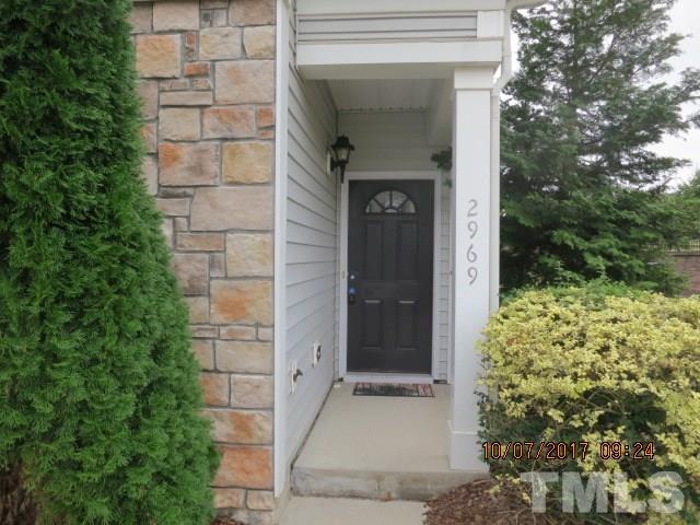 2969 Casona Way Raleigh, NC 27616 - Photo 2 of 7 a front view of a house with a yard