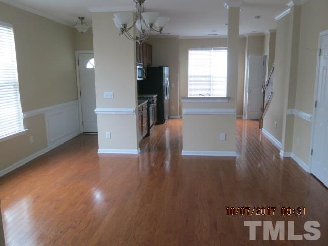 2969 Casona Way Raleigh, NC 27616 - Photo 6 of 7 a view of a livingroom with a furniture wooden floor and windows