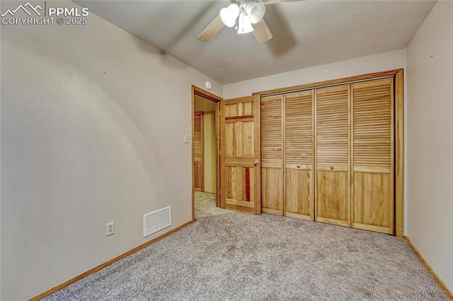 2135 Springcrest Road Colorado Springs, CO 80920 - Photo 40 of 48 Bedroom #5 with ceiling fan