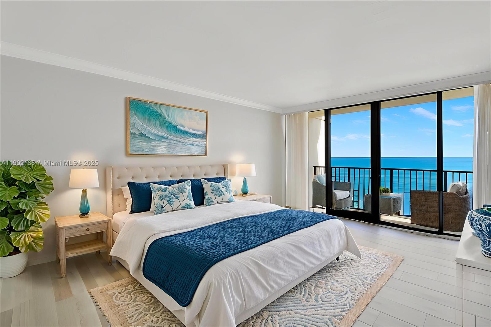 200 South Beach Road, Unit 703 Tequesta, FL 33469 - Photo 19 of 52 a bedroom with a large bed and a couch