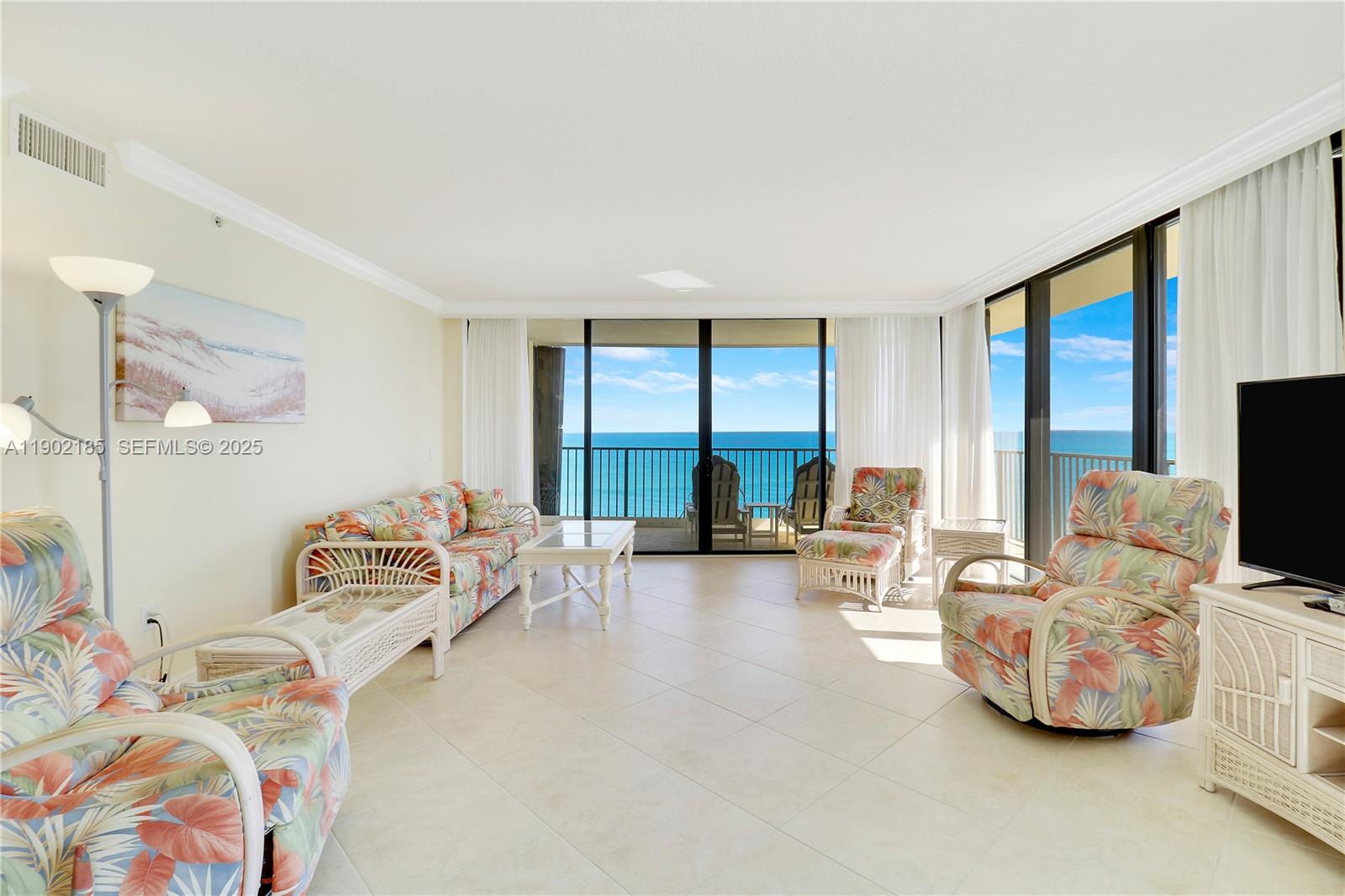 200 South Beach Road, Unit 703 Tequesta, FL 33469 - Photo 20 of 52 a bedroom with furniture and a large window