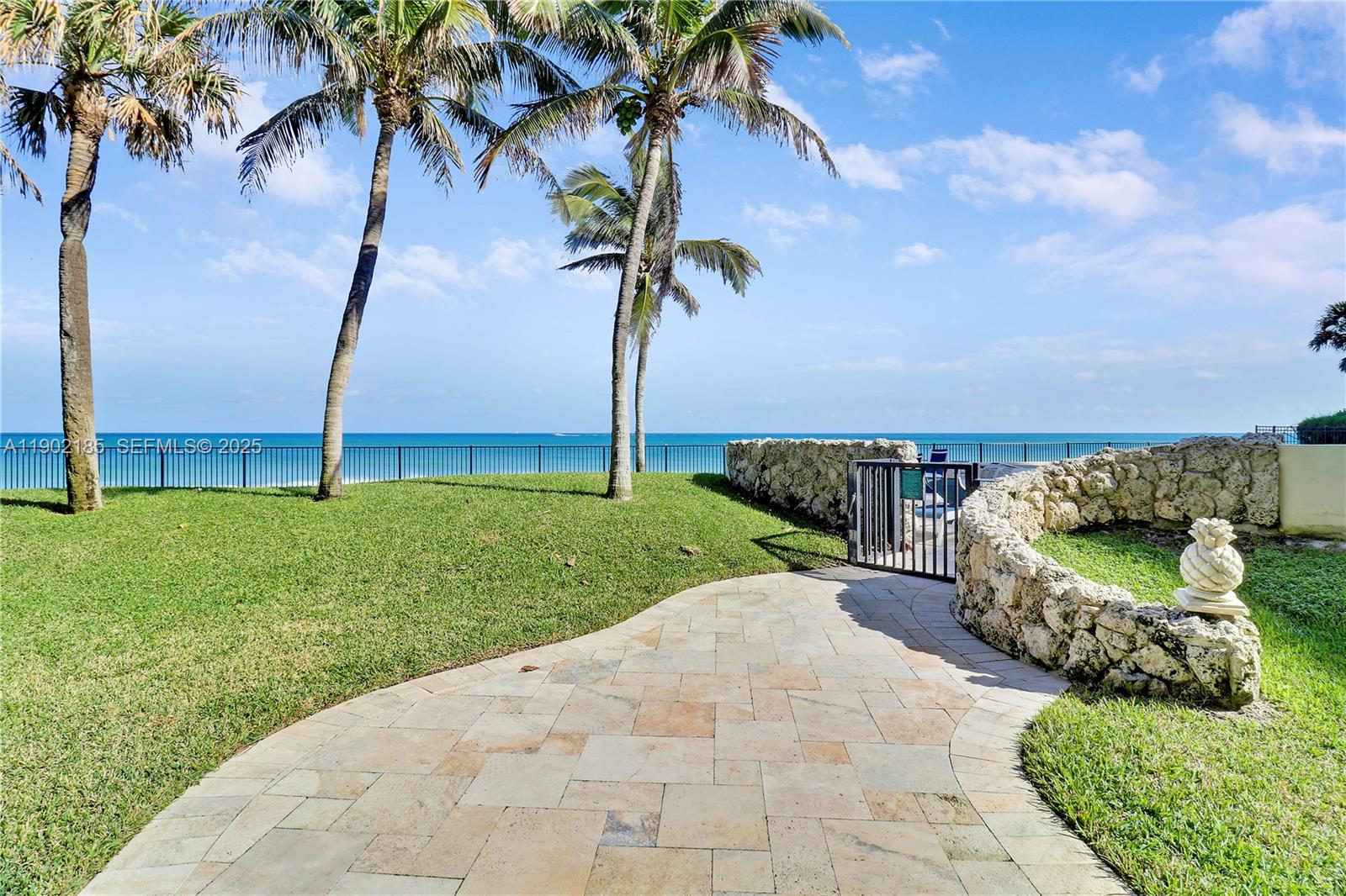 200 South Beach Road, Unit 703 Tequesta, FL 33469 - Photo 43 of 52 a view of a garden with a houses