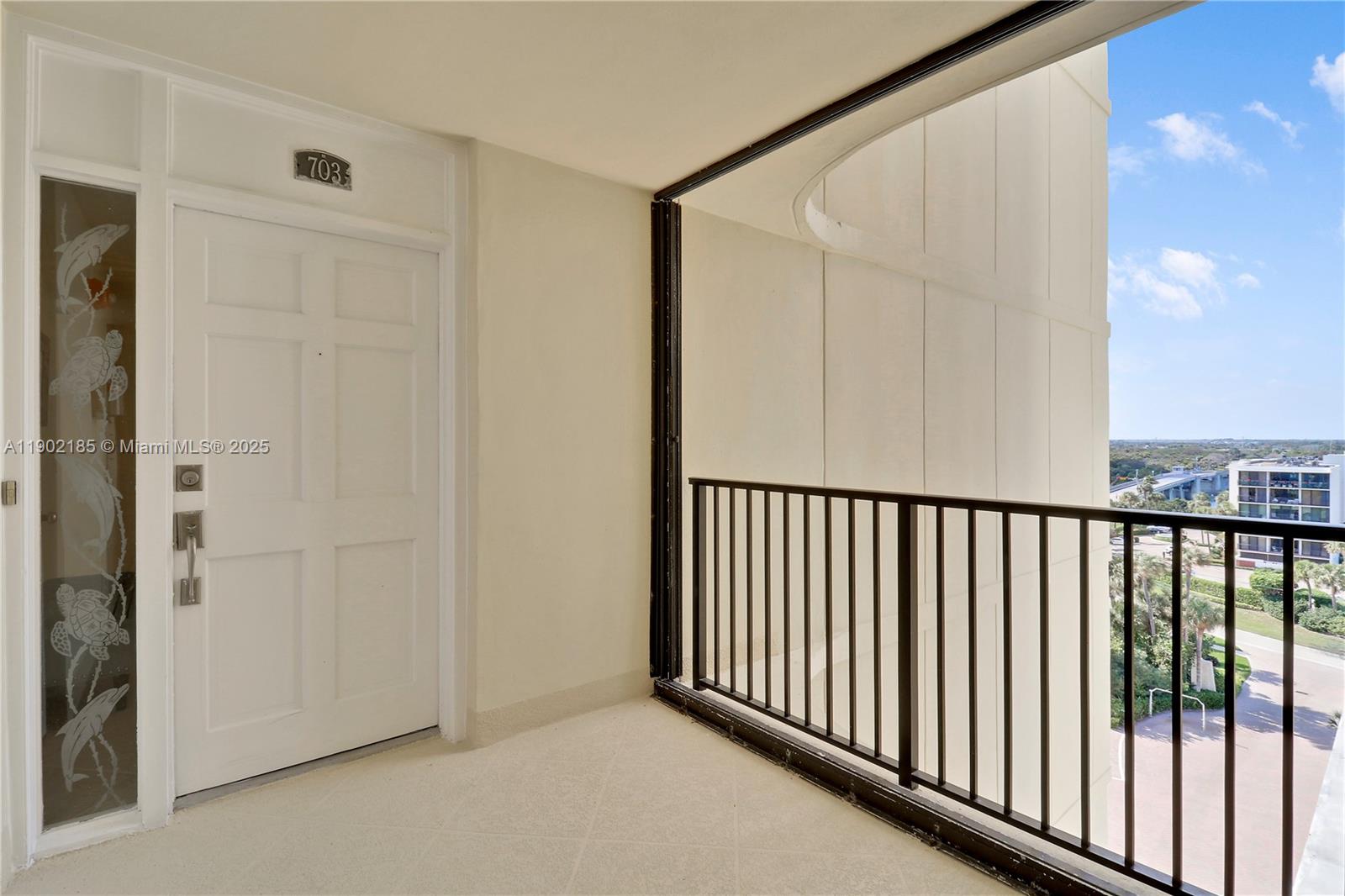 200 South Beach Road, Unit 703 Tequesta, FL 33469 - Photo 50 of 52 a view of a hallway