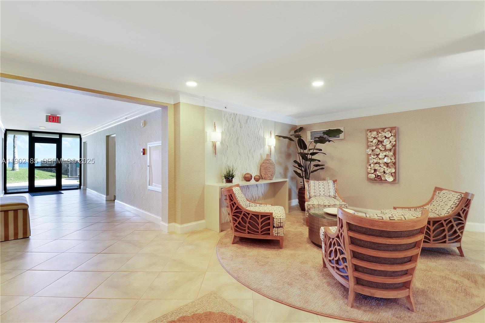 200 South Beach Road, Unit 703 Tequesta, FL 33469 - Photo 51 of 52 a living room with furniture and a window