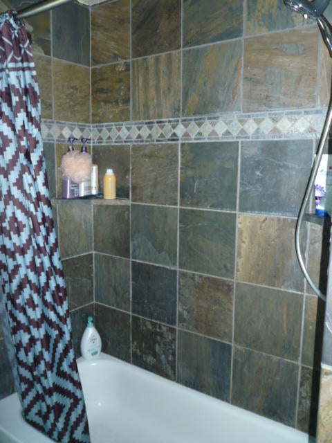 205 Latigo Ranch Road Williams, OR 97544 - Photo 18 of 50 Slate stone shower with shelves