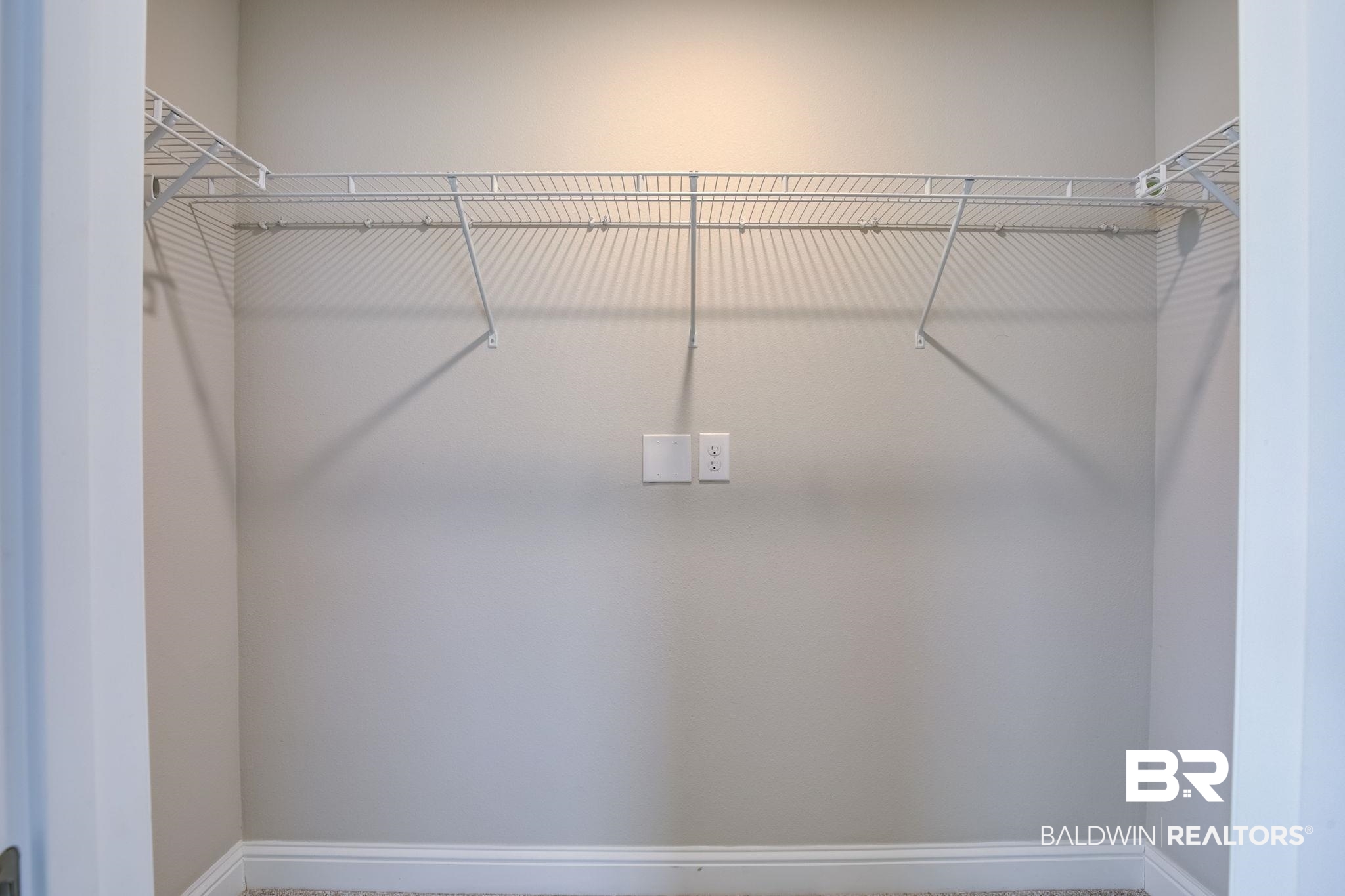25806 Pollard Road, Unit 60 Daphne, AL 36526 - Photo 22 of 35 View of walk in closet