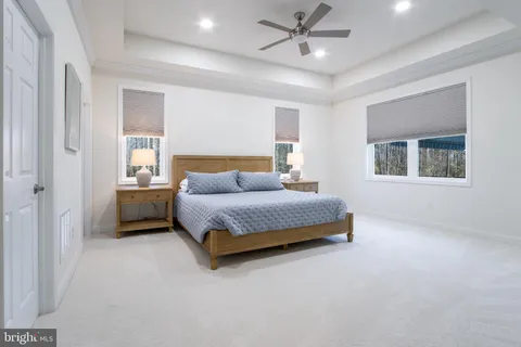 a view of a house with backyard porch and garden