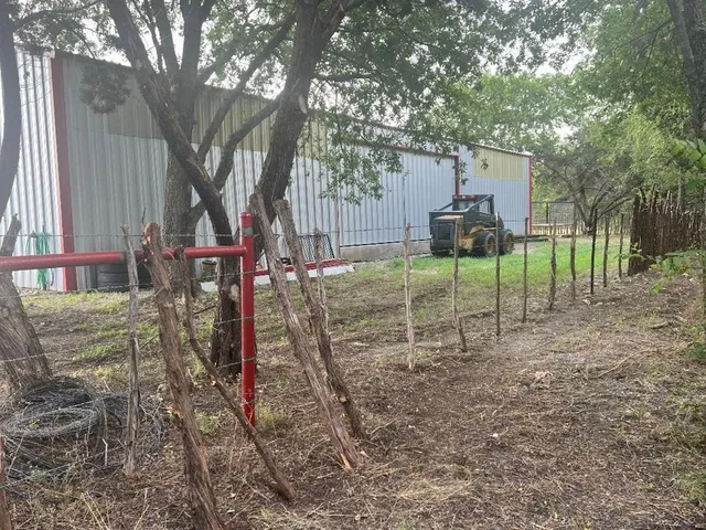 a view of a porch with furniture and a table
