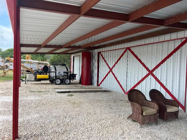 a room with lots of potted plants