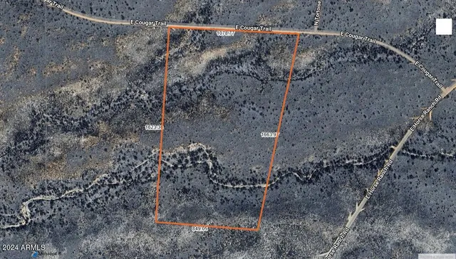 a view of a lake with a mountain in the background