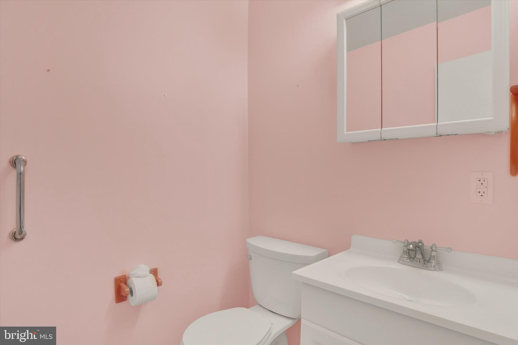 118 South 22nd Street Lebanon, PA 17042 - Photo 12 of 27 a bathroom with a sink a toilet and a mirror