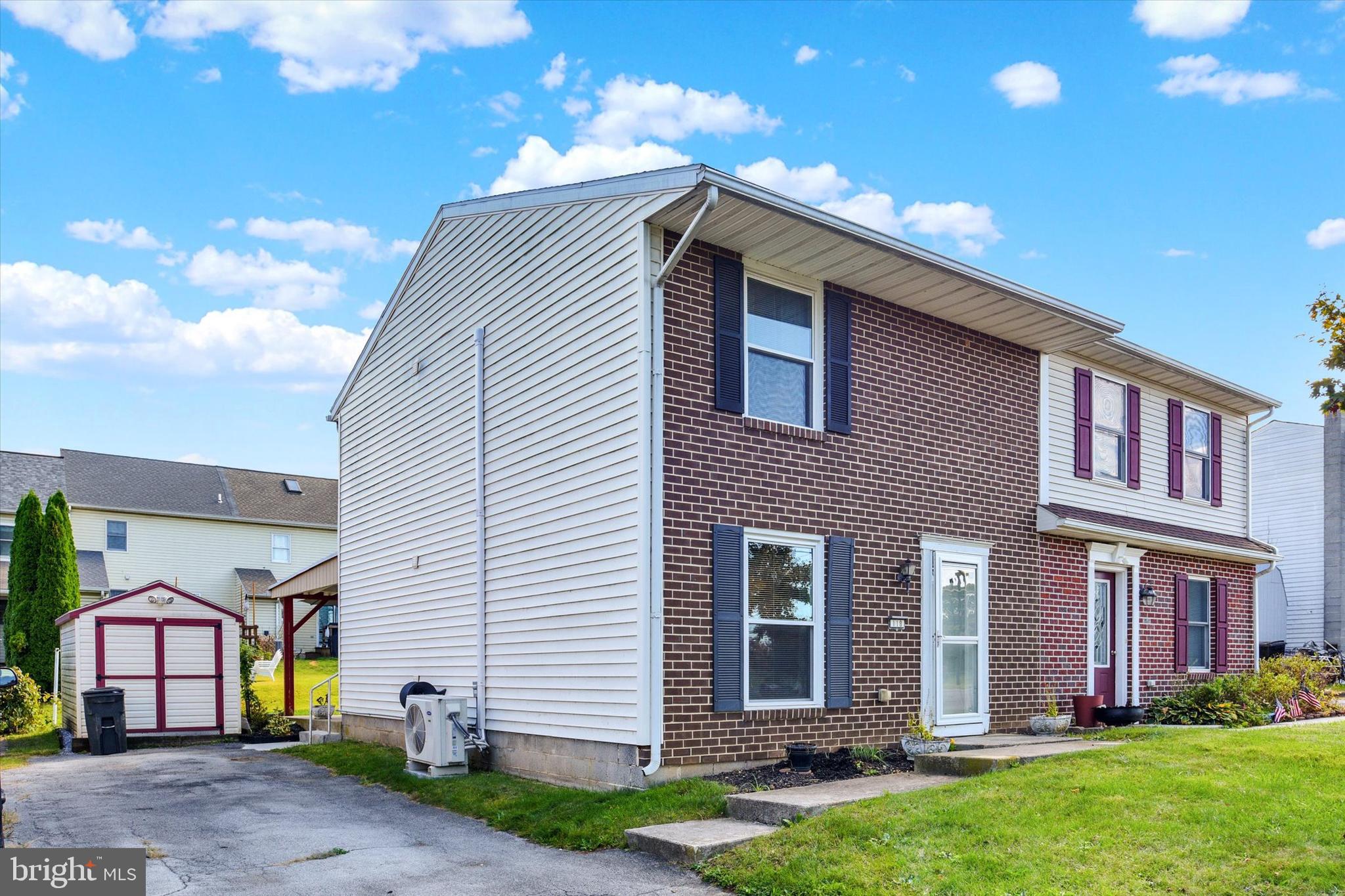 118 South 22nd Street Lebanon, PA 17042 - Photo 27 of 27 a front view of a house with a yard and garage