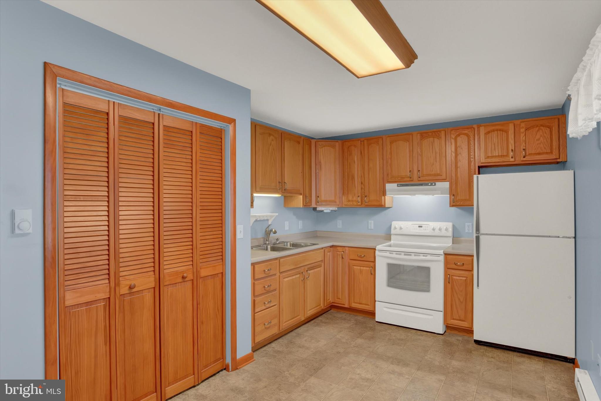 118 South 22nd Street Lebanon, PA 17042 - Photo 6 of 27 a kitchen with stainless steel appliances granite countertop a refrigerator a sink and a stove