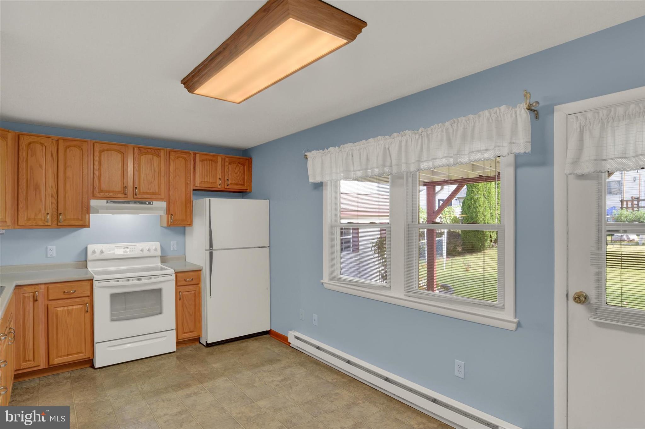 118 South 22nd Street Lebanon, PA 17042 - Photo 8 of 27 a kitchen with window and refrigerator