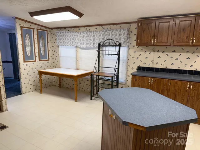 a view of kitchen island with furniture