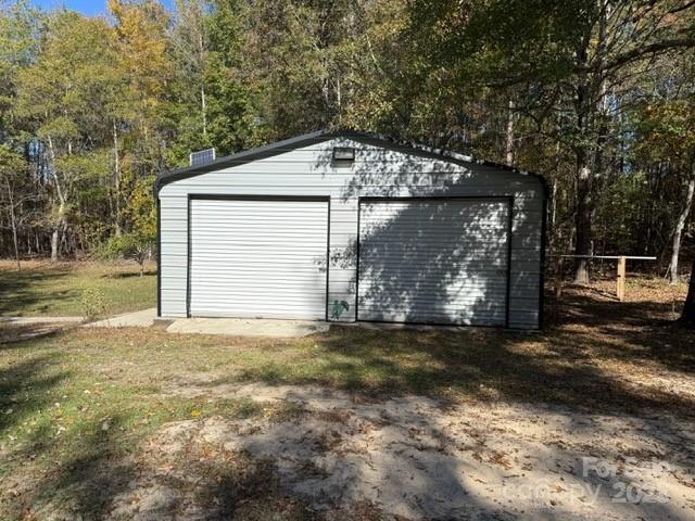 7159 Rev Melvin Adams Road Kershaw, SC 29067 - Photo 2 of 28 a backyard of a house with lots of green space