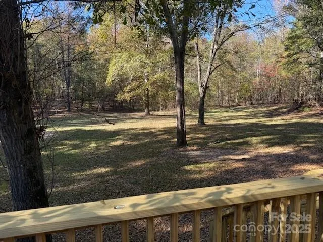 a view of a yard with an outdoor space