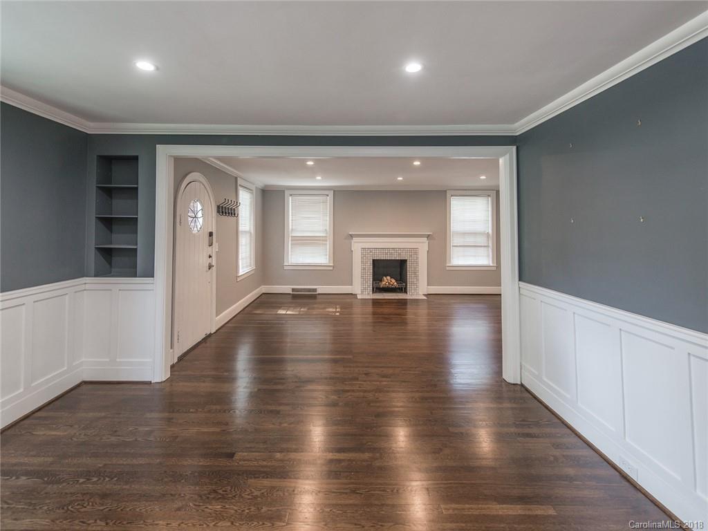 2711 Providence Road Charlotte, NC 28211 - Photo 14 of 35 wooden floor in an empty room with a window