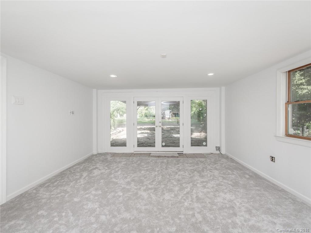 2711 Providence Road Charlotte, NC 28211 - Photo 17 of 35 an empty room with windows