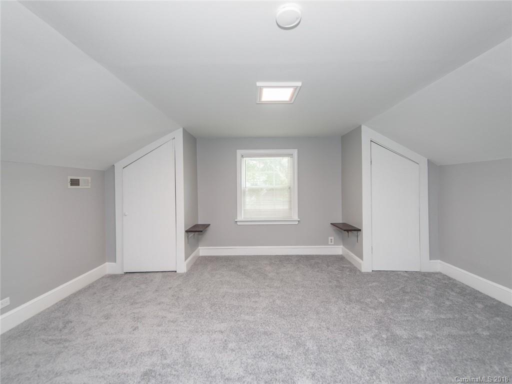 2711 Providence Road Charlotte, NC 28211 - Photo 27 of 35 an empty room with windows