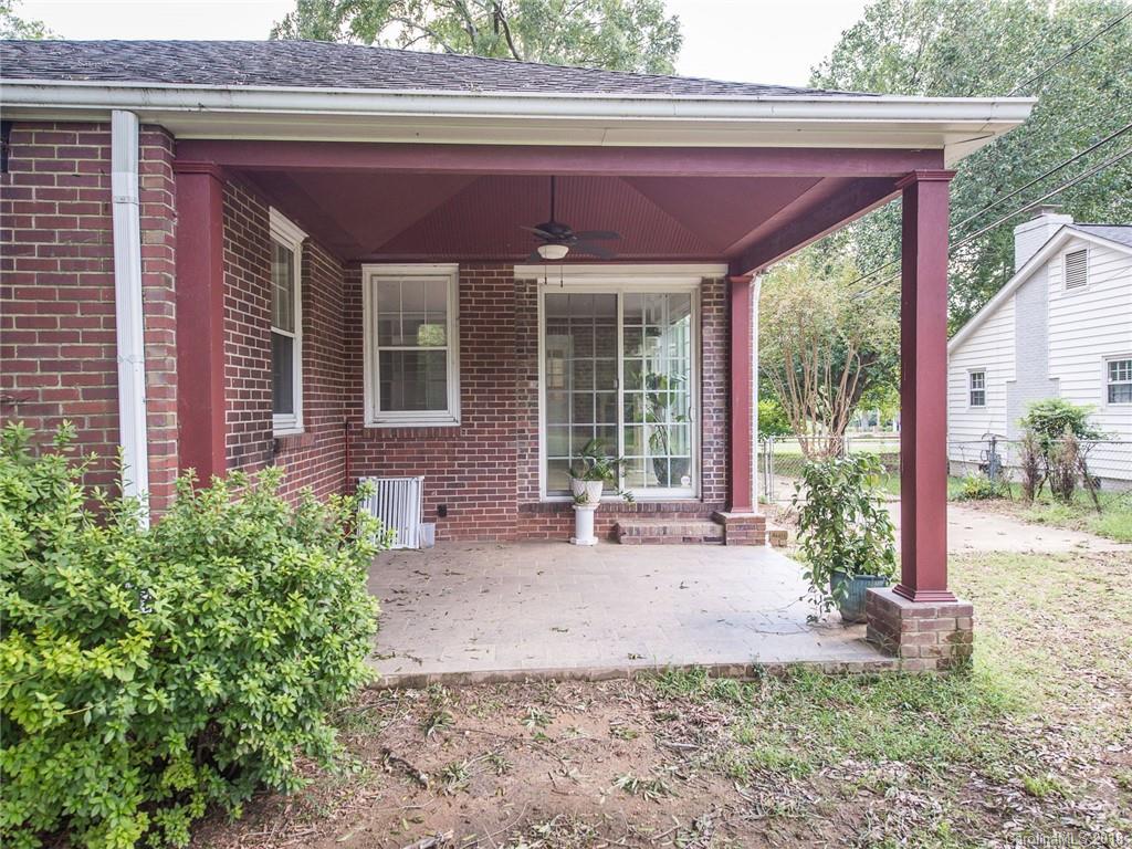 2711 Providence Road Charlotte, NC 28211 - Photo 29 of 35 a front view of a house with garden