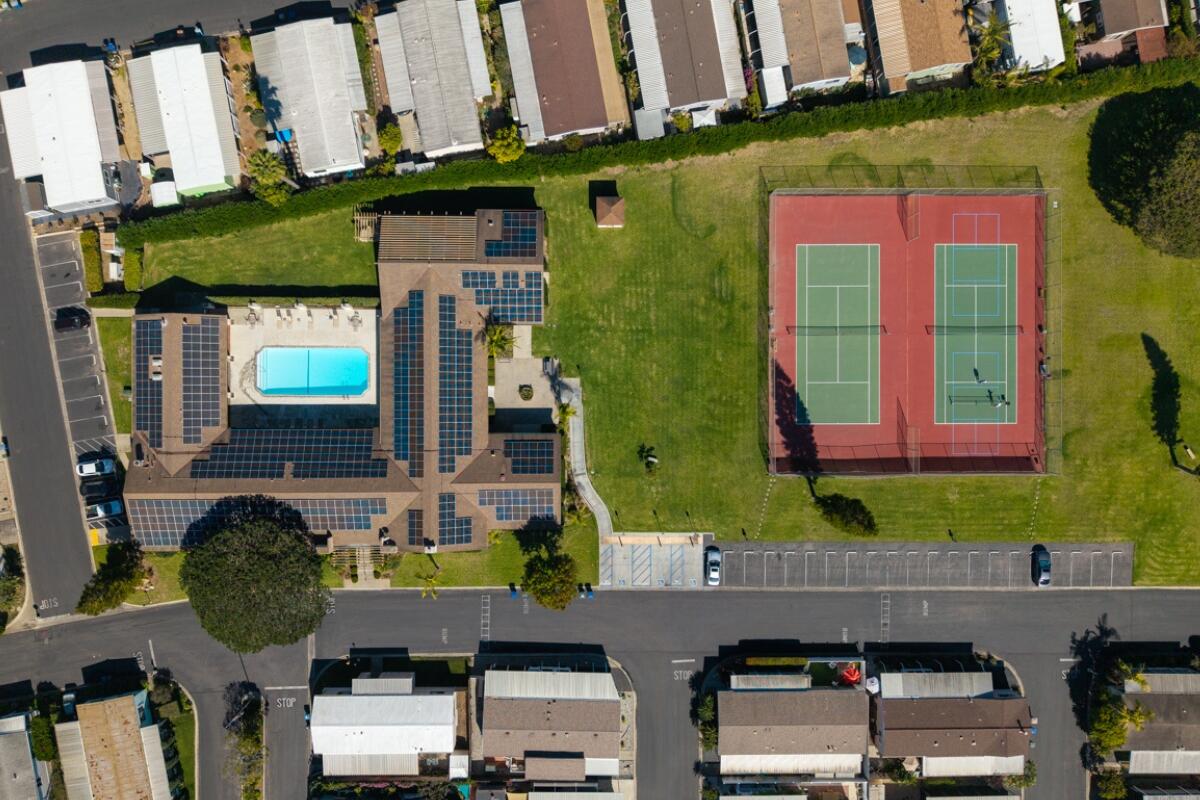 3950 Via Real, Unit 97 Carpinteria, CA 93013 - Photo 32 of 38 a store with outdoor seating area and car parked