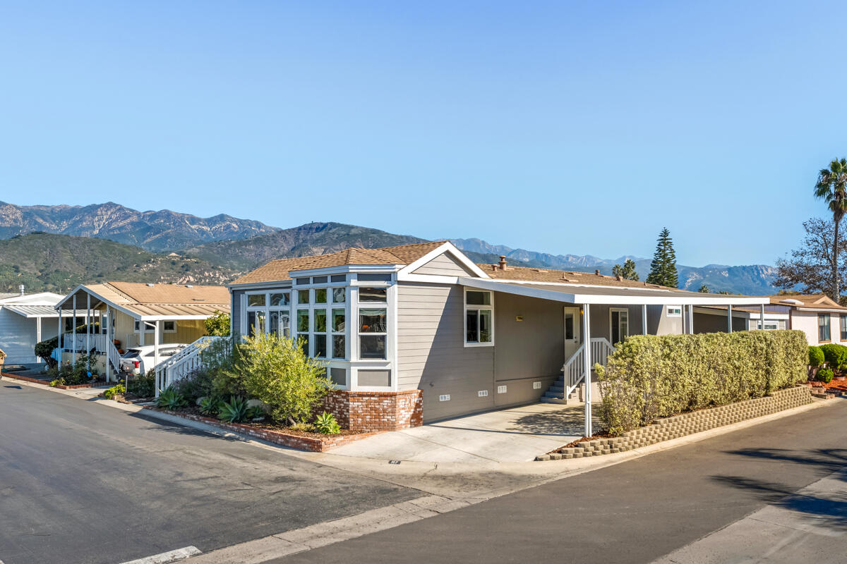 3950 Via Real, Unit 97 Carpinteria, CA 93013 - Photo 4 of 38 front view of a house with a street