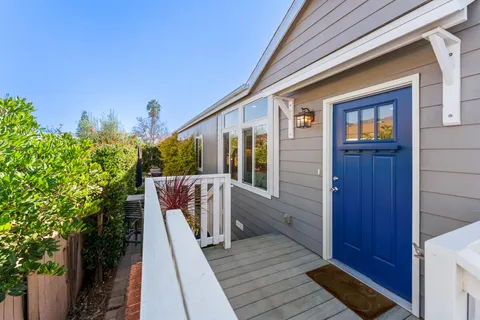 a view of a balcony with chairs