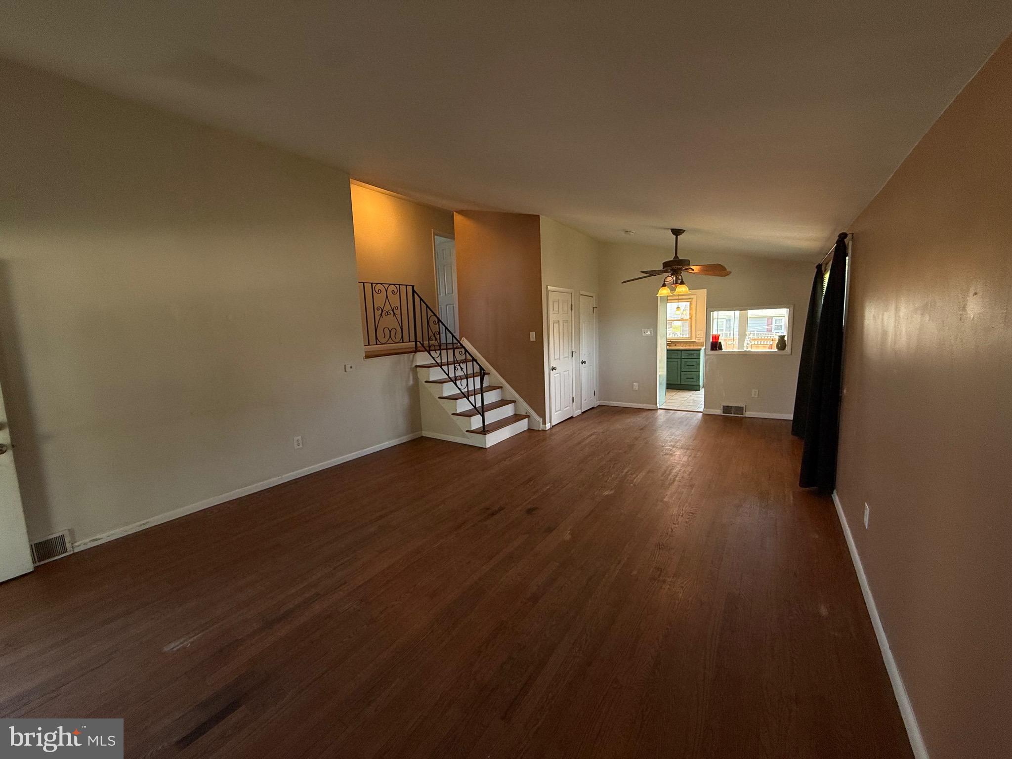 174 Kansas Road Pennsville, NJ 08070 - Photo 8 of 22 a view of a hallway with wooden floor