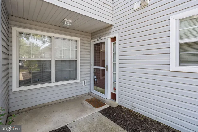 a view of a door and a window