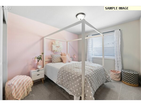 208 South 87th Avenue, Unit 60 Ridgefield, WA 98642 - Photo 28 of 32 a bedroom with a bed and a window