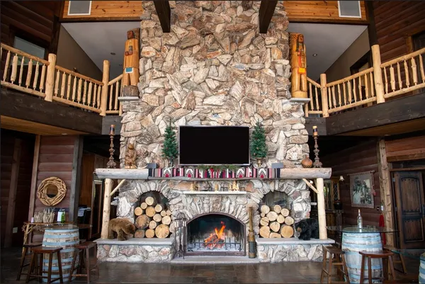 a bathroom with a toilet a sink and a window