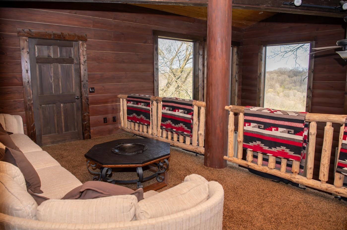 2003 West Hanover Road Hanover, IL 61041 - Photo 26 of 61 a living room with furniture and a fireplace