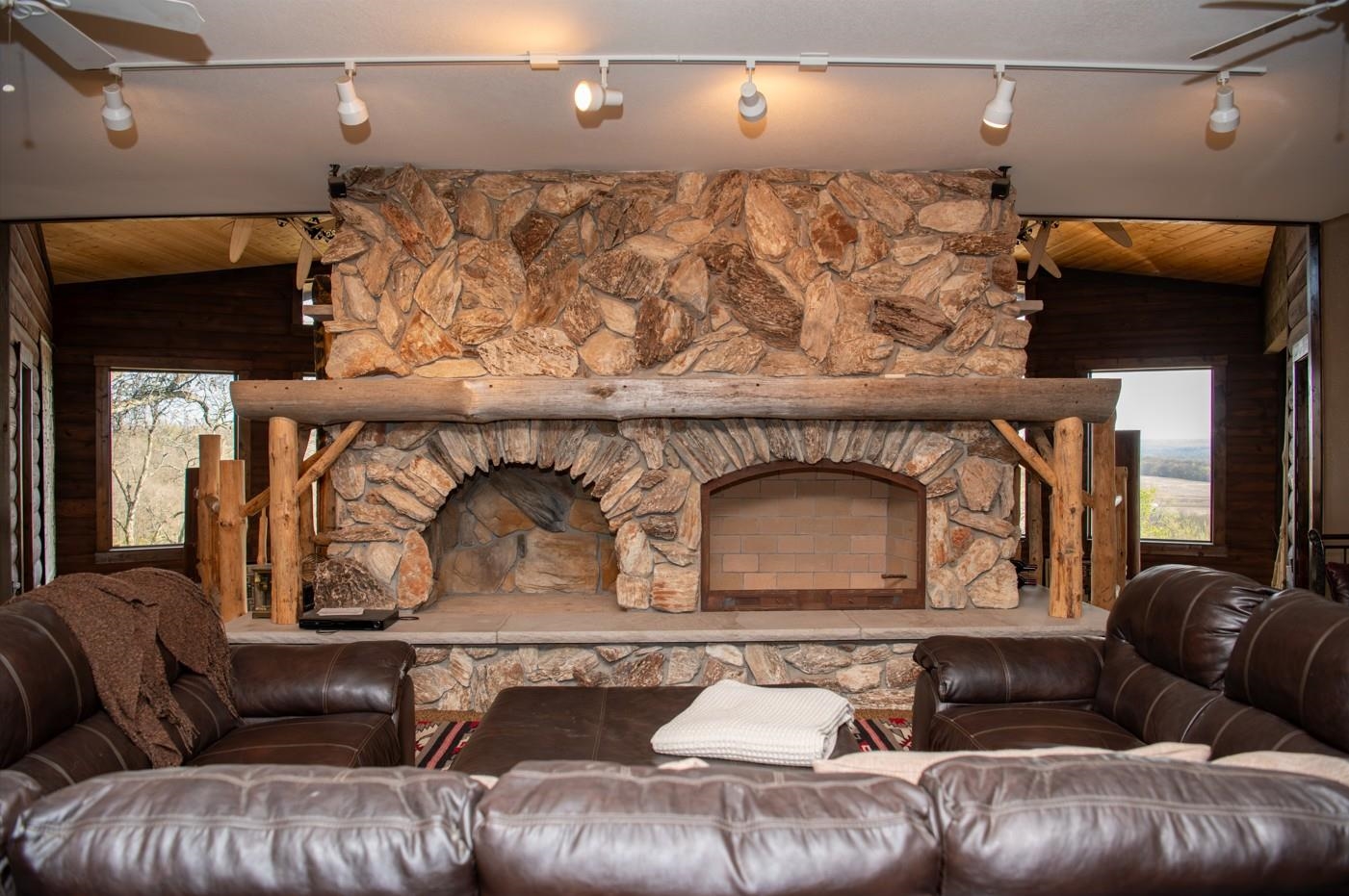 2003 West Hanover Road Hanover, IL 61041 - Photo 31 of 61 a living room with furniture and a fireplace