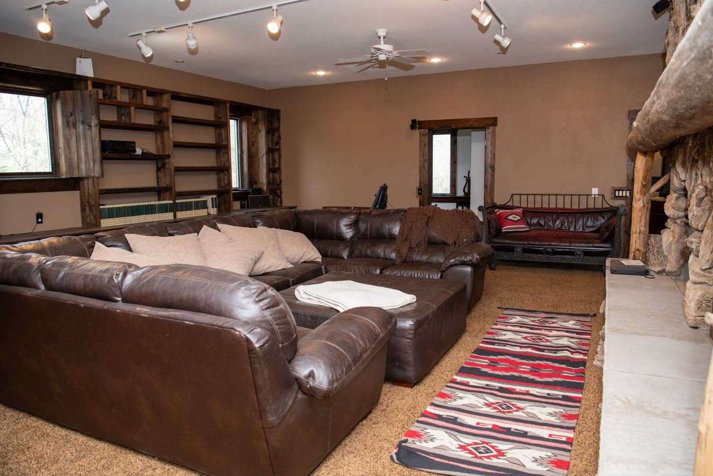 2003 West Hanover Road Hanover, IL 61041 - Photo 32 of 61 a living room with furniture and a chandelier