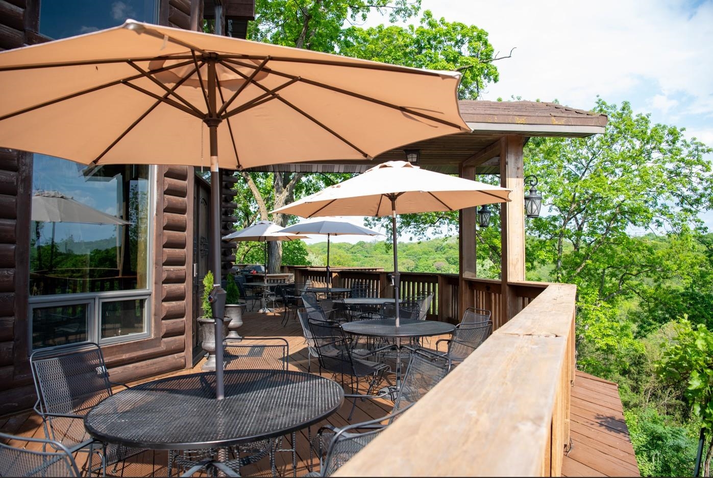 2003 West Hanover Road Hanover, IL 61041 - Photo 48 of 61 a view of table and chairs under an umbrella