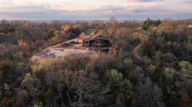 a view of a backyard of the house