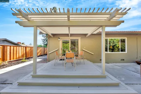 a view of a living room and a chandelier