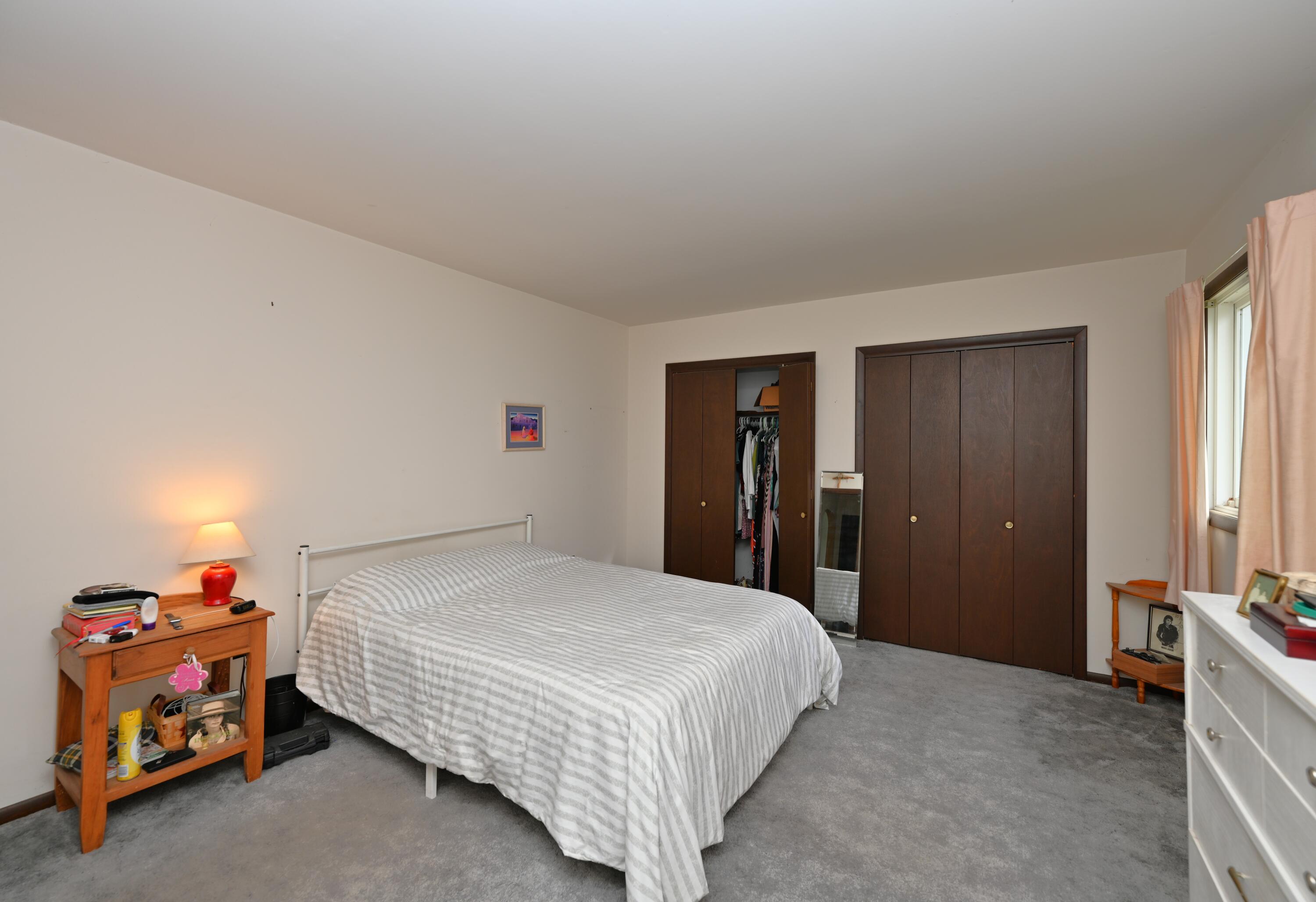 5110 West 400 North Winamac, IN 46996 - Photo 28 of 35 a bedroom with a bed and a lamp