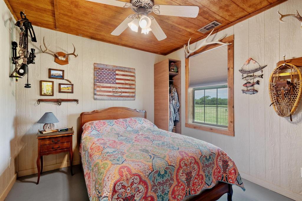 2931 Wall Street Road Howe, TX 75459 - Photo 17 of 38 a bedroom with a bed and a window
