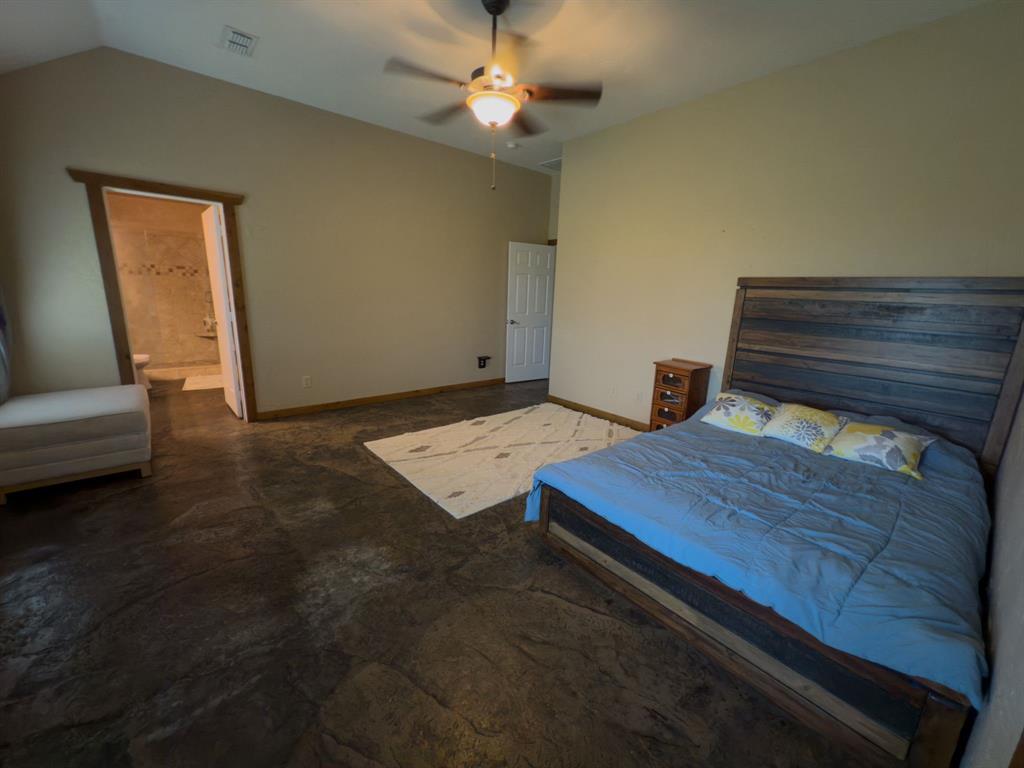 2931 Wall Street Road Howe, TX 75459 - Photo 37 of 38 a bed sitting in a room next to a window