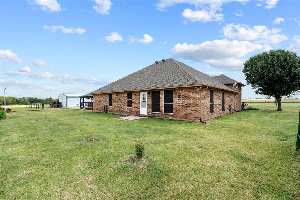 2931 Wall Street Road Howe, TX 75459 - Photo 5 of 38 a view of a house with a big yard