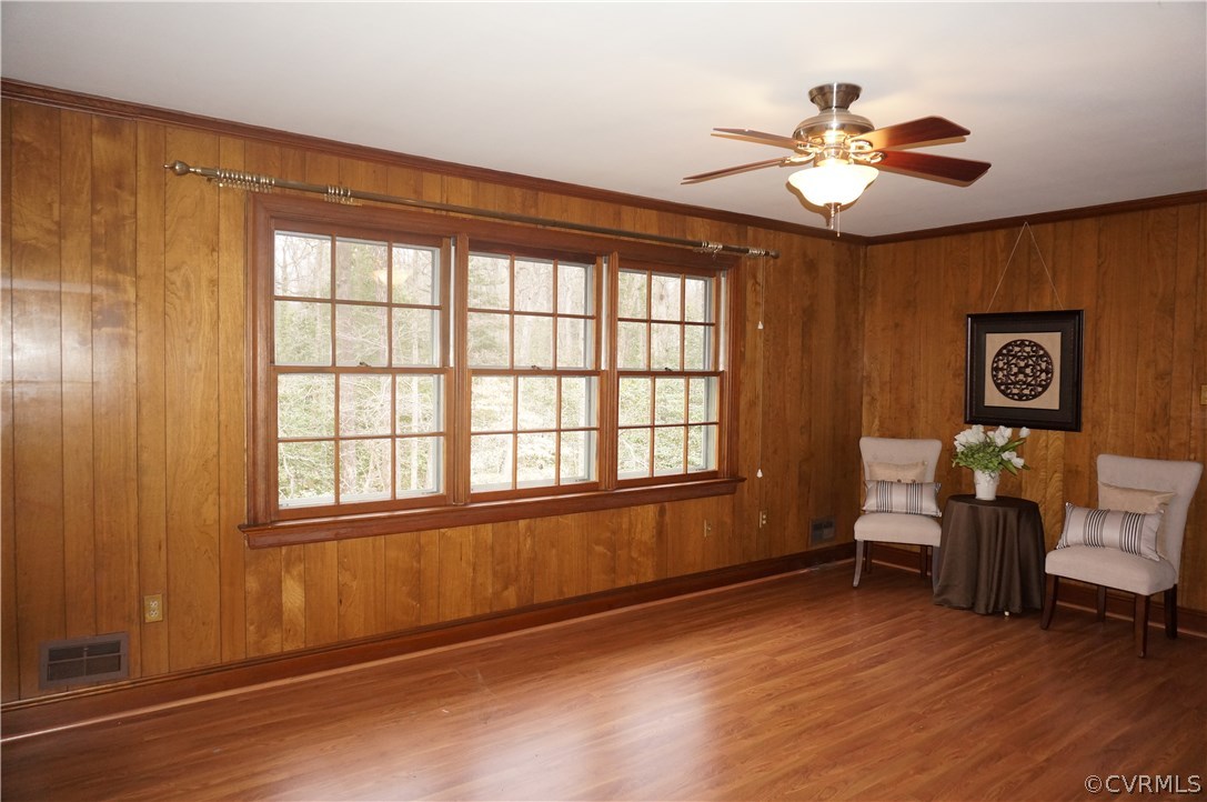 3701 East Old Gun Road Midlothian, VA 23113 - Photo 12 of 19 a view of an empty room with a window and wooden floor