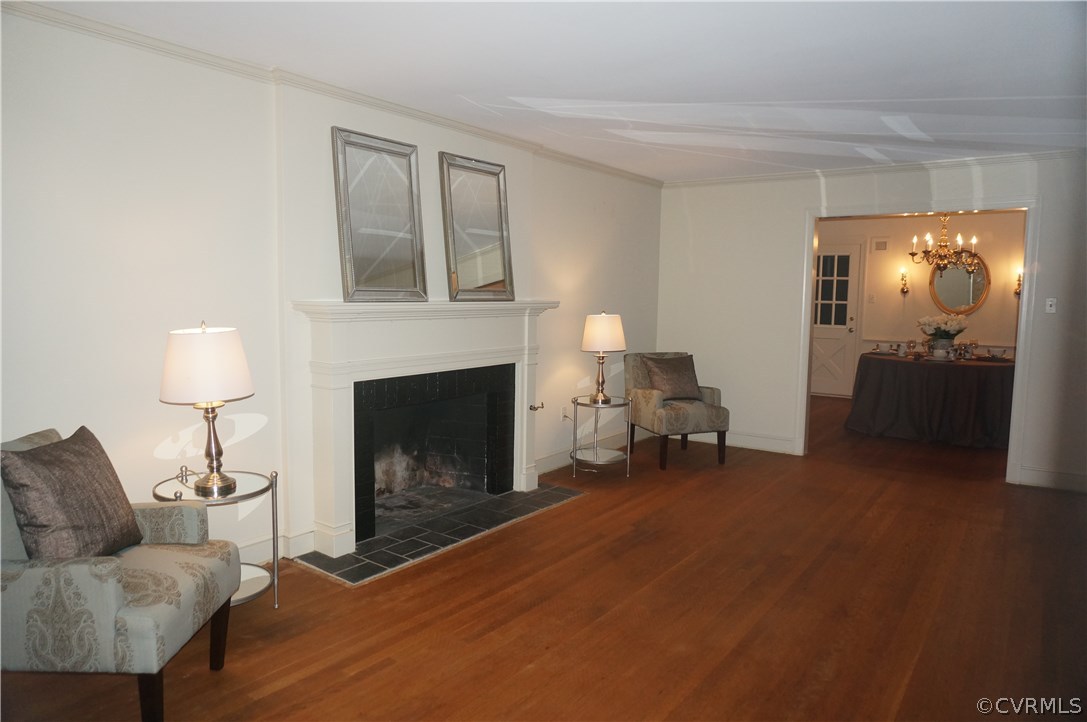 3701 East Old Gun Road Midlothian, VA 23113 - Photo 3 of 19 a living room with furniture and a fireplace